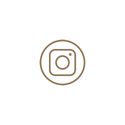 Instagram logo in gold on a black background