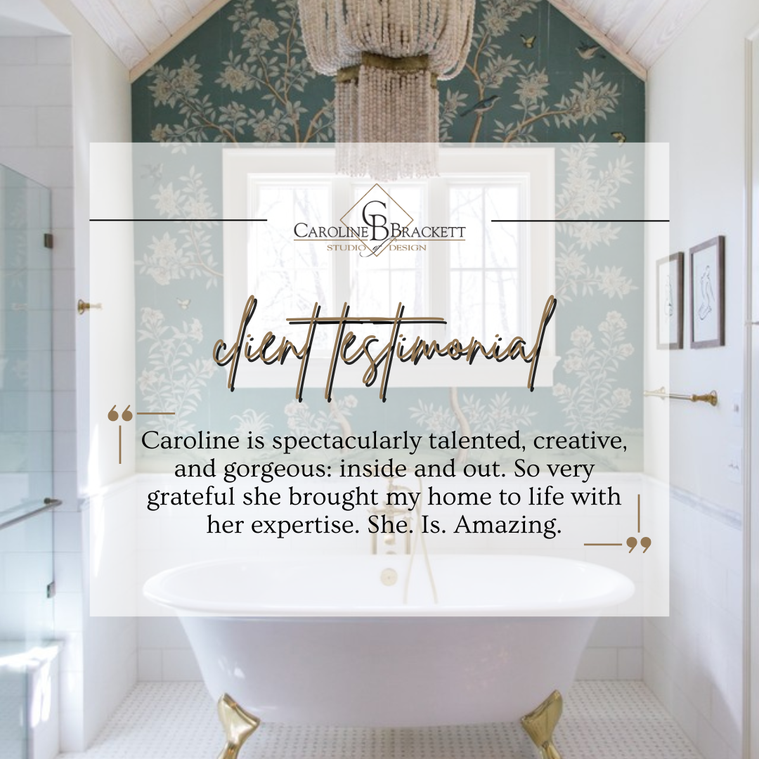 Testimonial graphic with a bathroom backdrop, featuring a white bathtub with gold clawfoot style legs, framed artwork on the white walls, and a decorative chandelier hanging from the ceiling. The graphic includes the logo for Caroline Brackett Studio Design and a quote praising Caroline's talent and creativity.